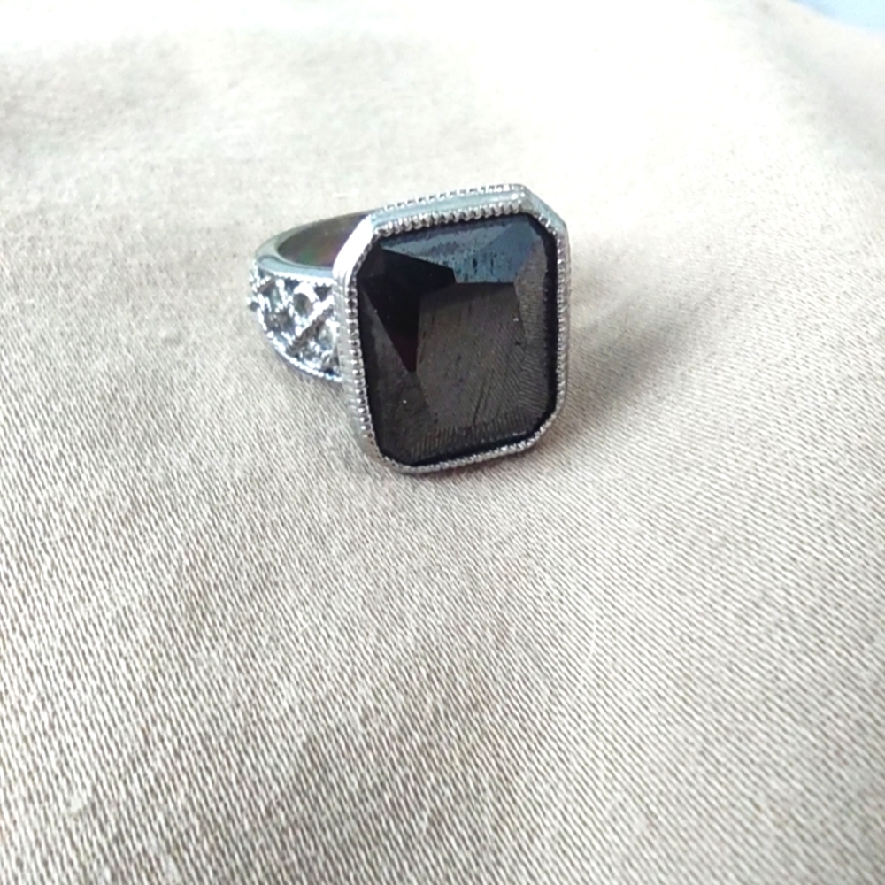 Black stone ring in silver plated setting